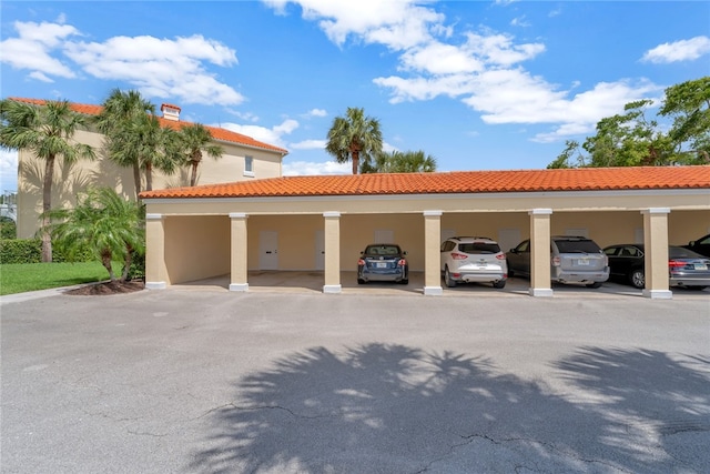 exterior space featuring a carport