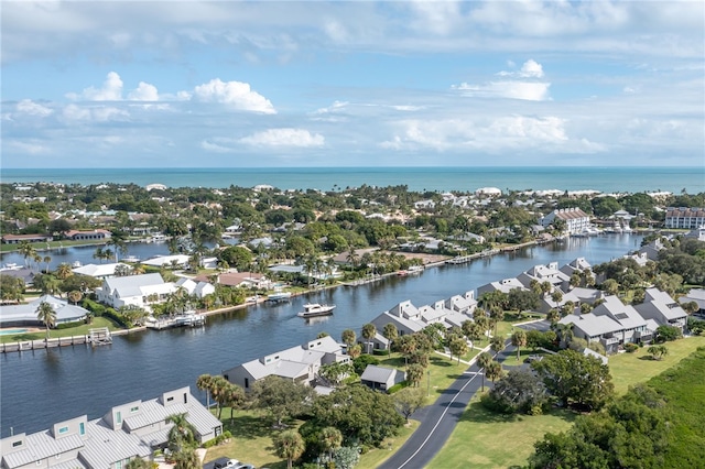 birds eye view of property featuring a water view