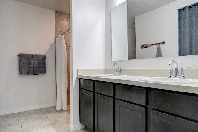 bathroom featuring vanity, walk in shower, and tile patterned flooring