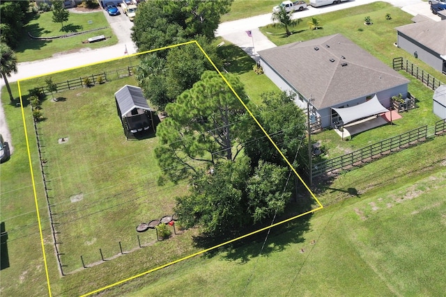 birds eye view of property featuring a rural view