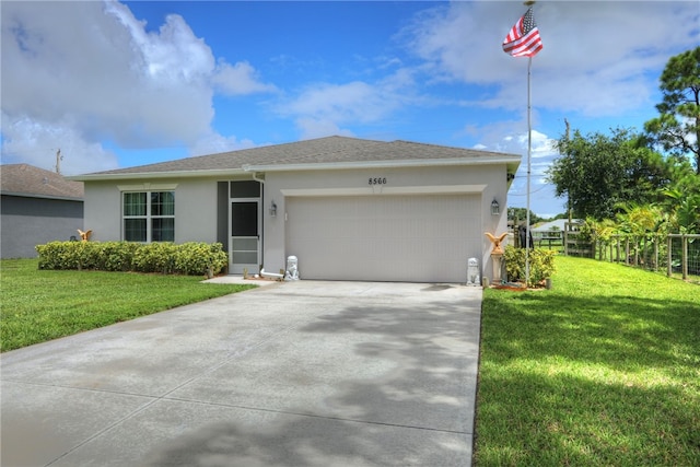 single story home with a front lawn and a garage