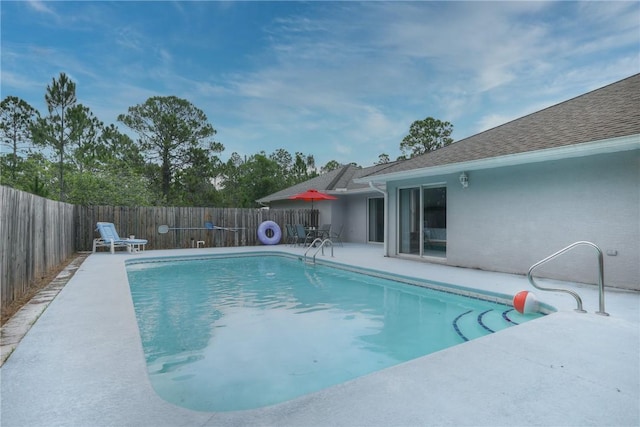 view of pool featuring a patio