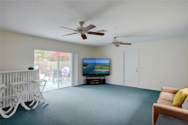 interior space featuring carpet floors and a textured ceiling