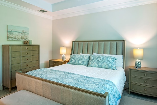 bedroom with ornamental molding