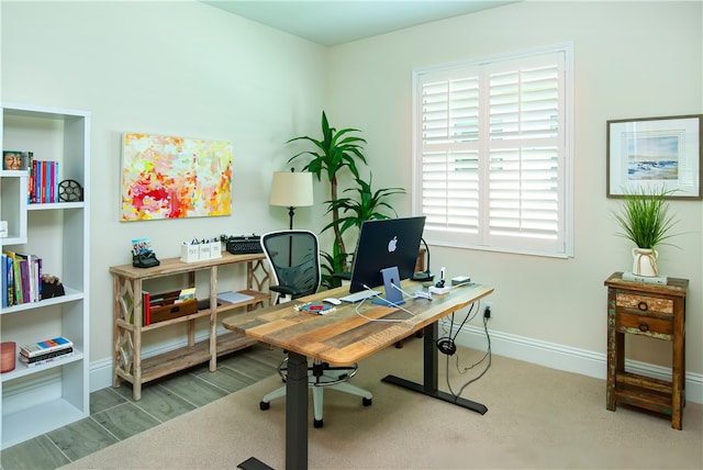 office area with hardwood / wood-style floors