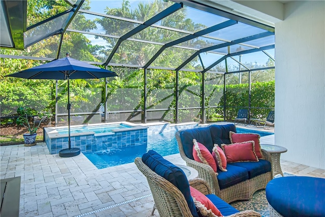 view of swimming pool featuring pool water feature, glass enclosure, a patio, and an in ground hot tub