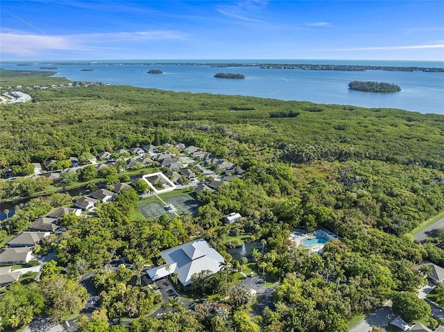 birds eye view of property featuring a residential view and a water view