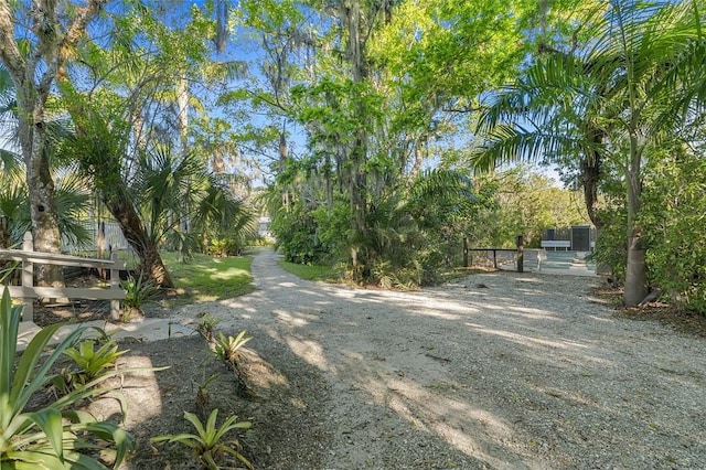 view of road featuring a gate