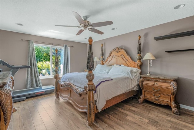 4565 61st Ter, Vero Beach, FL 32967 - bedroom with wood finished floors, ceiling fan, and baseboards