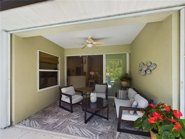 view of patio with ceiling fan and an outdoor hangout area