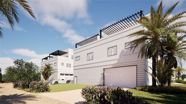 5290 94th Ln, Sebastian, FL 32958 - view of side of property featuring an attached garage and a yard