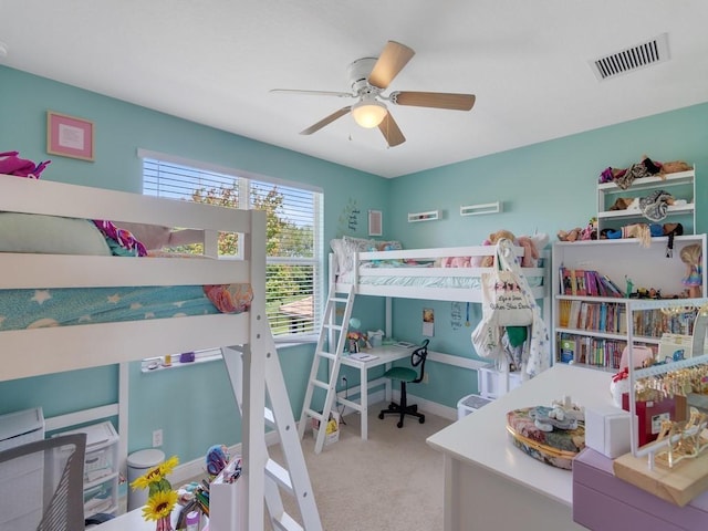 bedroom with carpet, visible vents, baseboards, and ceiling fan