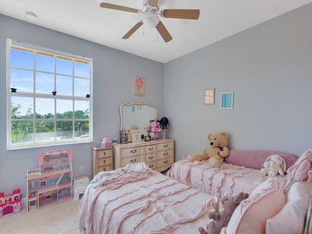 carpeted bedroom featuring ceiling fan