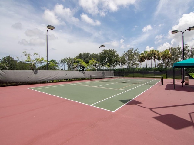 view of sport court with community basketball court and fence