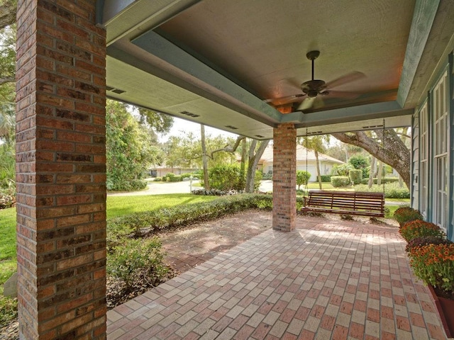 view of patio / terrace featuring ceiling fan