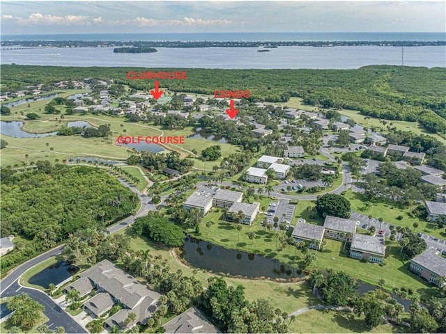 aerial view featuring a water view and a residential view