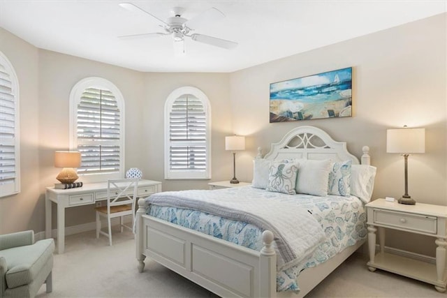 2214 Falls Cir, Vero Beach, FL 32967 - bedroom featuring ceiling fan and light colored carpet