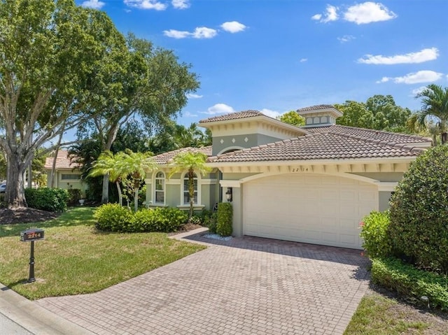 2214 Falls Cir, Vero Beach, FL 32967 - mediterranean / spanish home with a garage and a front yard