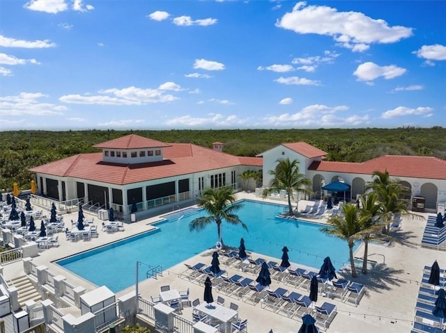 2214 Falls Cir, Vero Beach, FL 32967 - view of swimming pool with a patio