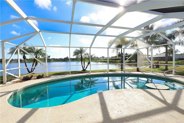5688 Riverboat Cir SW, Vero Beach, FL 32968 - outdoor pool featuring a water view, a lanai, and a patio area