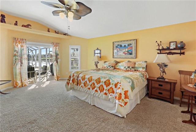 5688 Riverboat Cir SW, Vero Beach, FL 32968 - bedroom with lofted ceiling, carpet floors, baseboards, access to exterior, and a ceiling fan