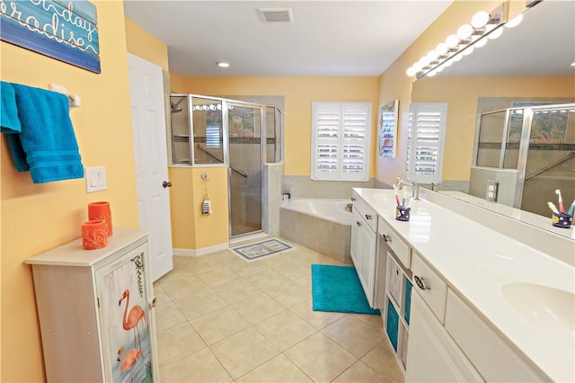 5688 Riverboat Cir SW, Vero Beach, FL 32968 - full bathroom with plenty of natural light, tile patterned floors, a bath, and a shower stall