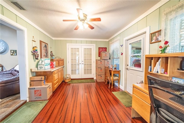 game room with visible vents, a ceiling fan, dark wood-style floors, a textured ceiling, and french doors