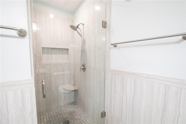 bathroom featuring a shower stall