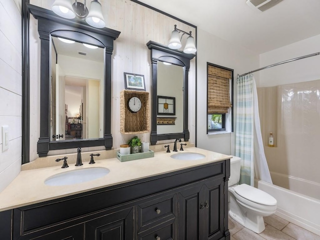 full bath with tile patterned flooring, visible vents, a sink, and toilet