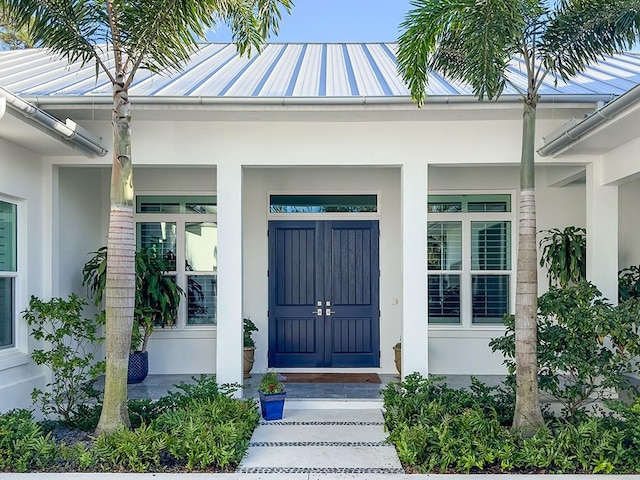 entrance to property with a porch