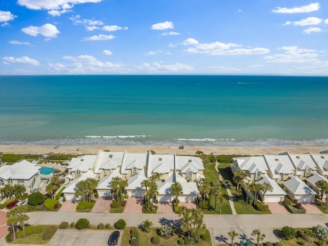 water view featuring a view of the beach and a residential view