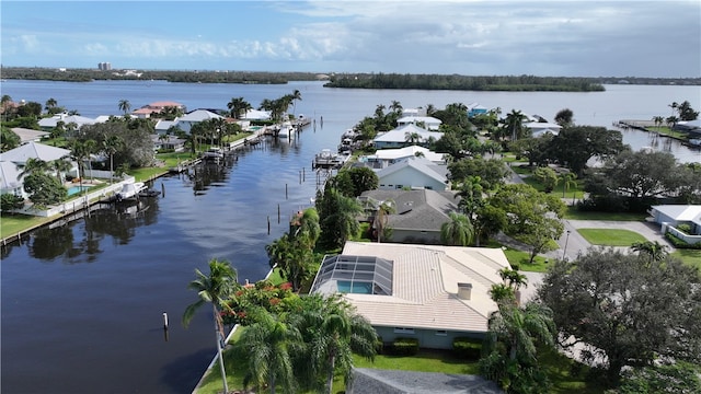 drone / aerial view with a water view