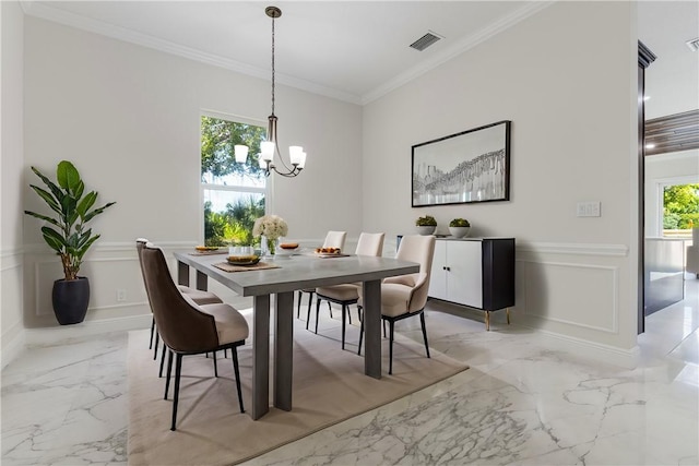 dining space featuring ornamental molding, marble finish floor, visible vents, and a decorative wall