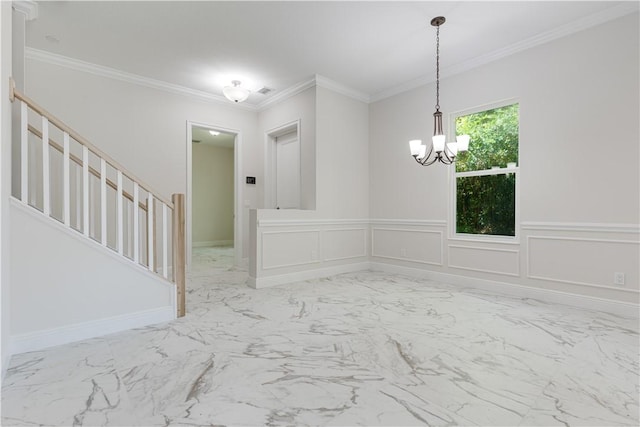 interior space with ornamental molding, marble finish floor, a chandelier, and a decorative wall