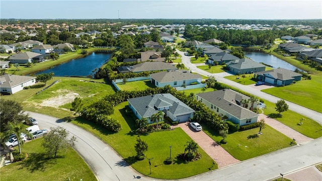5990 Bearberry Dr, Vero Beach, FL 32967 - aerial perspective of suburban area featuring a large body of water