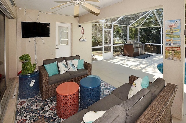 view of patio / terrace featuring ceiling fan and glass enclosure