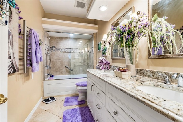 full bathroom with enclosed tub / shower combo, vanity, toilet, and tile patterned flooring