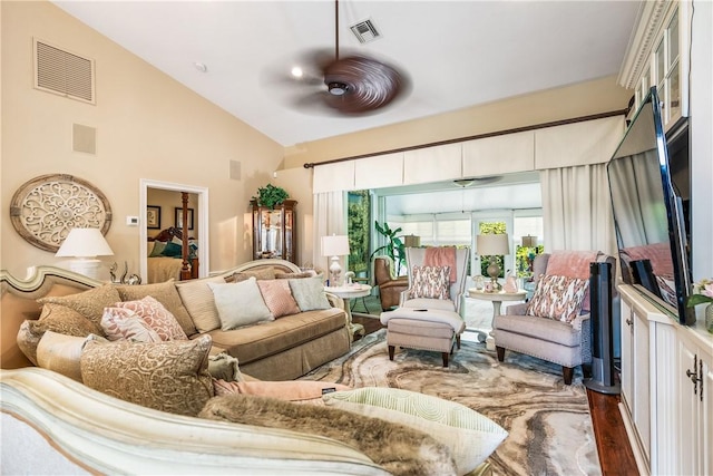 interior space with ceiling fan, lofted ceiling, and dark hardwood / wood-style floors