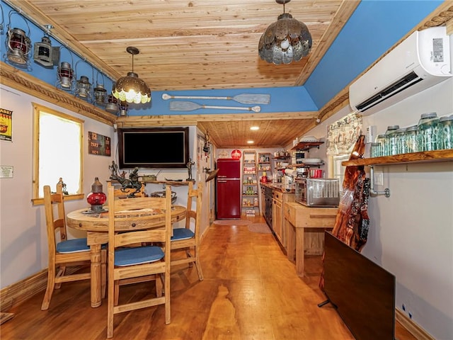 dining room with baseboards, lofted ceiling, a wall mounted air conditioner, wooden ceiling, and light wood-type flooring