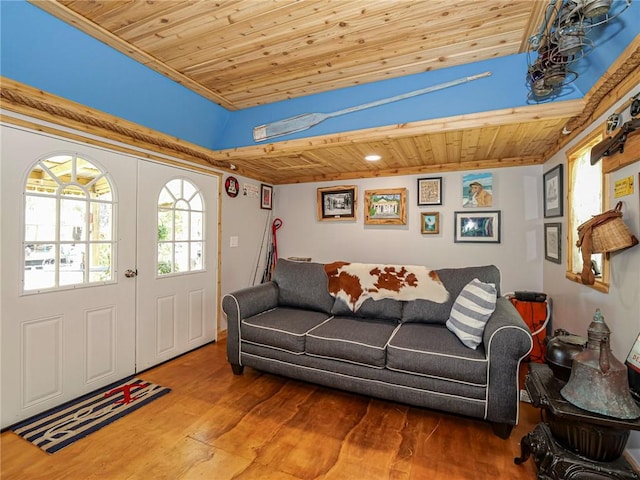 living room with wooden ceiling and wood finished floors