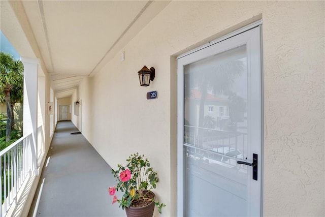 5040 Harmony Cir Unit 205, Vero Beach, FL 32967 - entrance to property with stucco siding