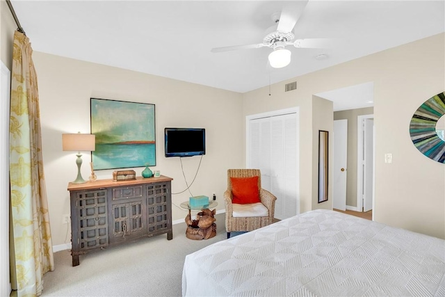 5040 Harmony Cir Unit 205, Vero Beach, FL 32967 - bedroom with baseboards, a closet, carpet flooring, and ceiling fan