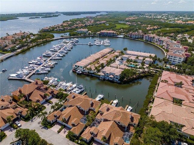 5040 Harmony Cir Unit 205, Vero Beach, FL 32967 - aerial view of property and surrounding area featuring numerous boat docks, a nearby body of water, and nearby suburban area