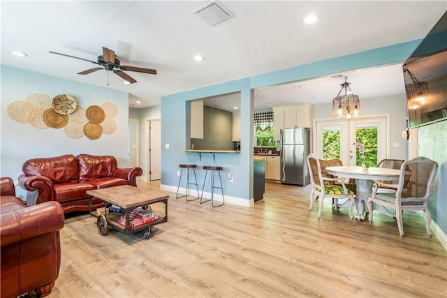 1717 20th Ave, Vero Beach, FL 32960 - living area featuring light wood-style floors, recessed lighting, and ceiling fan