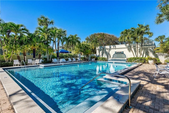 view of pool featuring a patio area