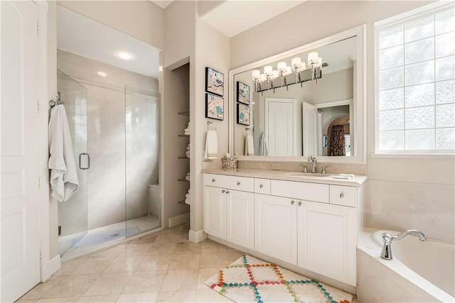 bathroom with separate shower and tub, tile patterned flooring, and vanity