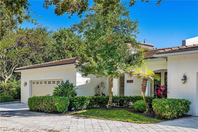 view of front of property featuring a garage