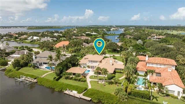 740 Lagoon Rd, Vero Beach, FL 32963 - aerial perspective of suburban area featuring a large body of water