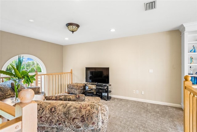 740 Lagoon Rd, Vero Beach, FL 32963 - carpeted living area featuring baseboards and recessed lighting