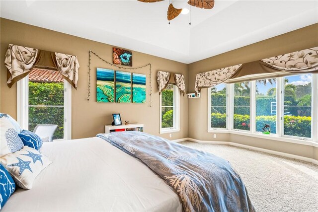 740 Lagoon Rd, Vero Beach, FL 32963 - bedroom featuring carpet, baseboards, and ceiling fan